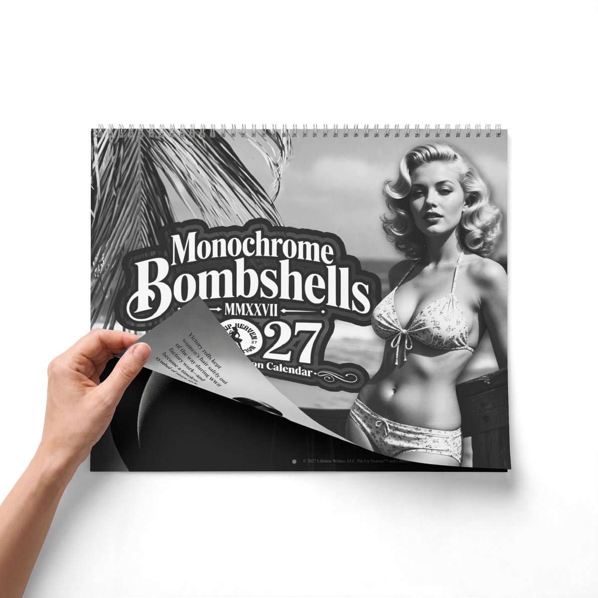 Monochrome Bombshells 2027 Pin-Up Calendar by Pin-Up Heaven — folded closed, spiral binding and hanging hole