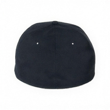 America 250th Silver Seal Fitted Cap — lifestyle view of the patriotic fitted seamless performance hat, perfect for Fourth of July and Father's Day